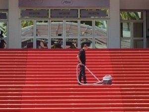 cleaning a stairs carpet with vacuum cleaner